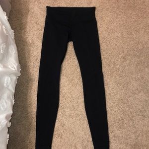 Black wunder under lululemon leggings.